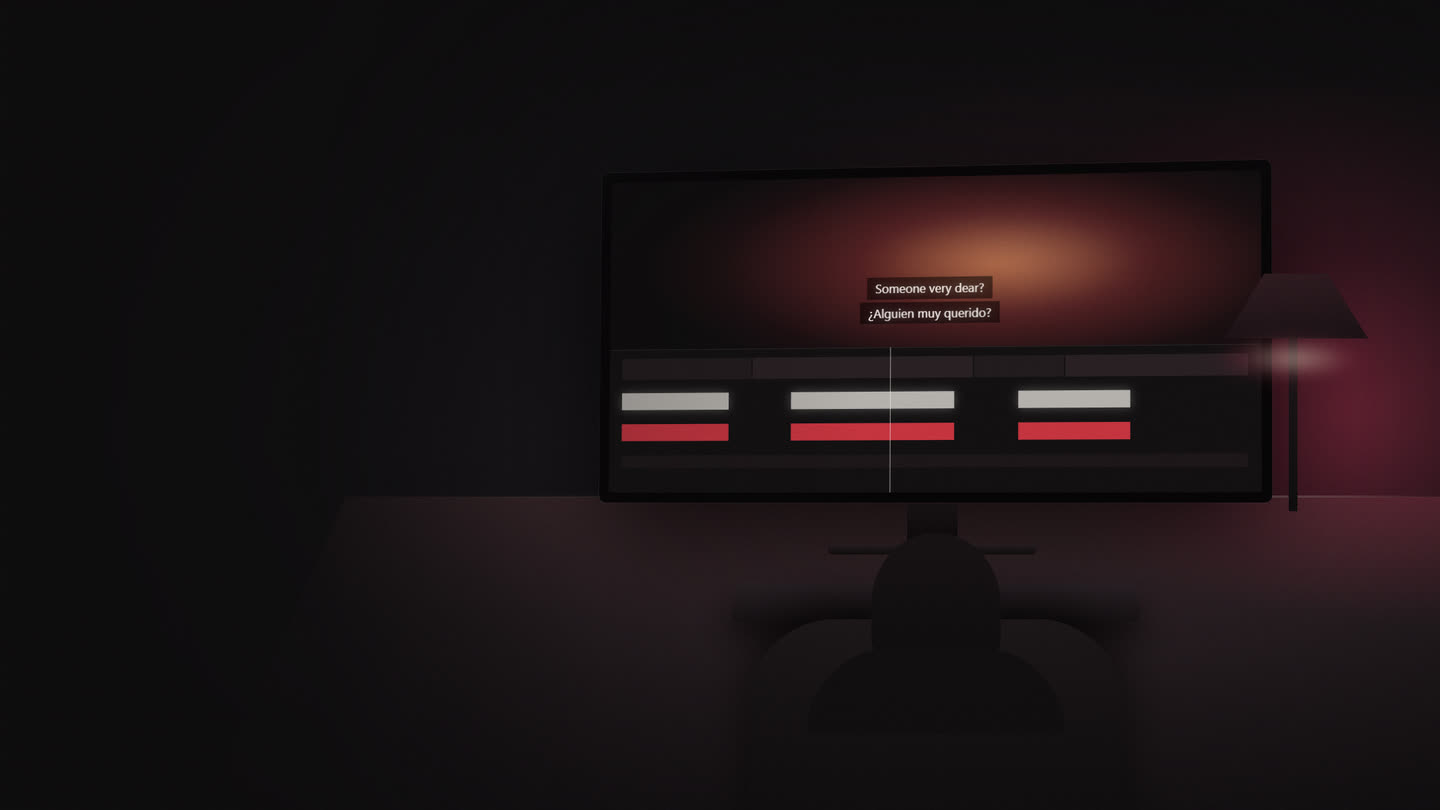 An editing desk at night seen from behind. A wide monitor shows a video timeline with two caption tracks, one lit warm white and one lit red.